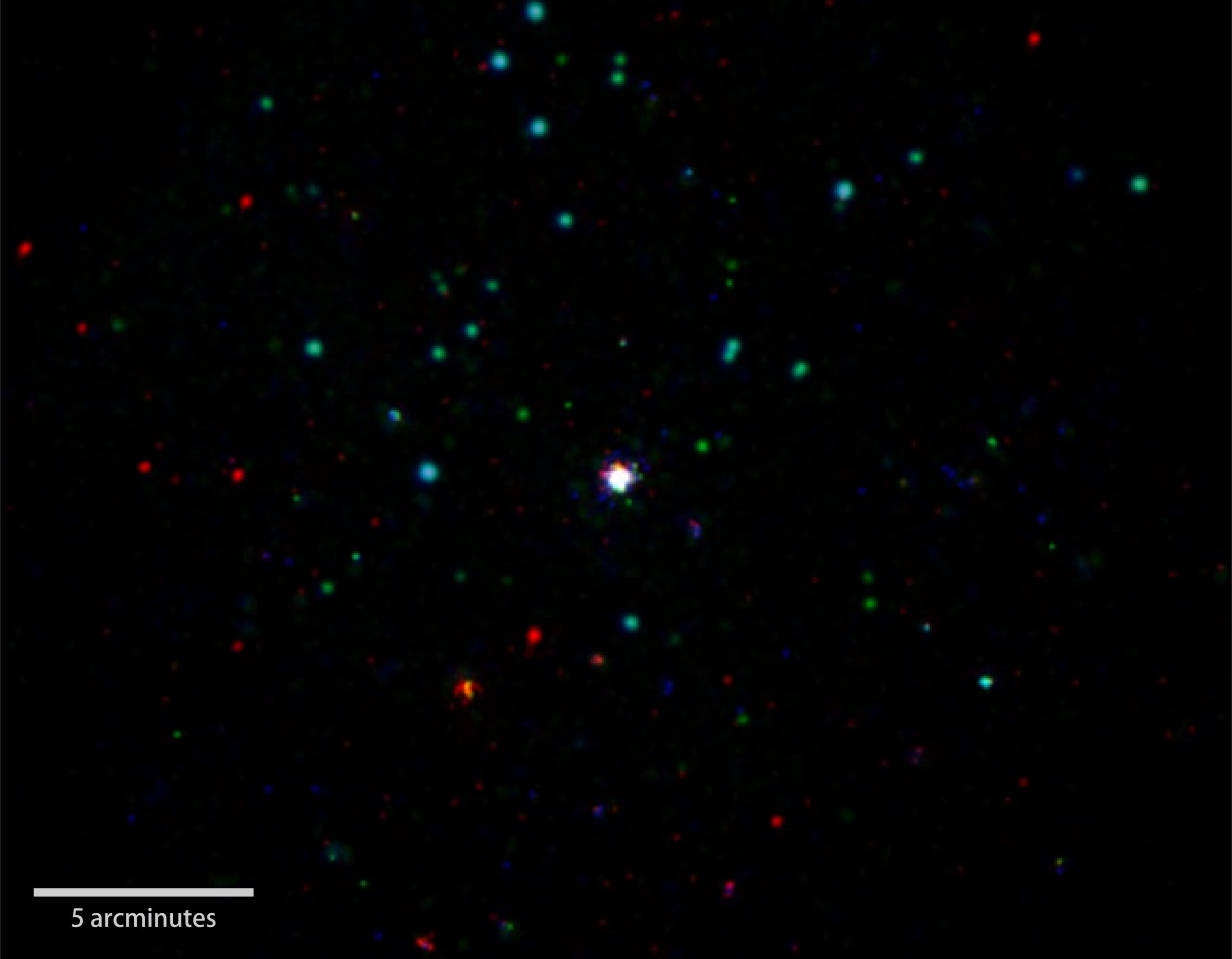 GRB 151027B, Swift's 1,000th burst (center), is shown in this composite X-ray, ultraviolet and op...