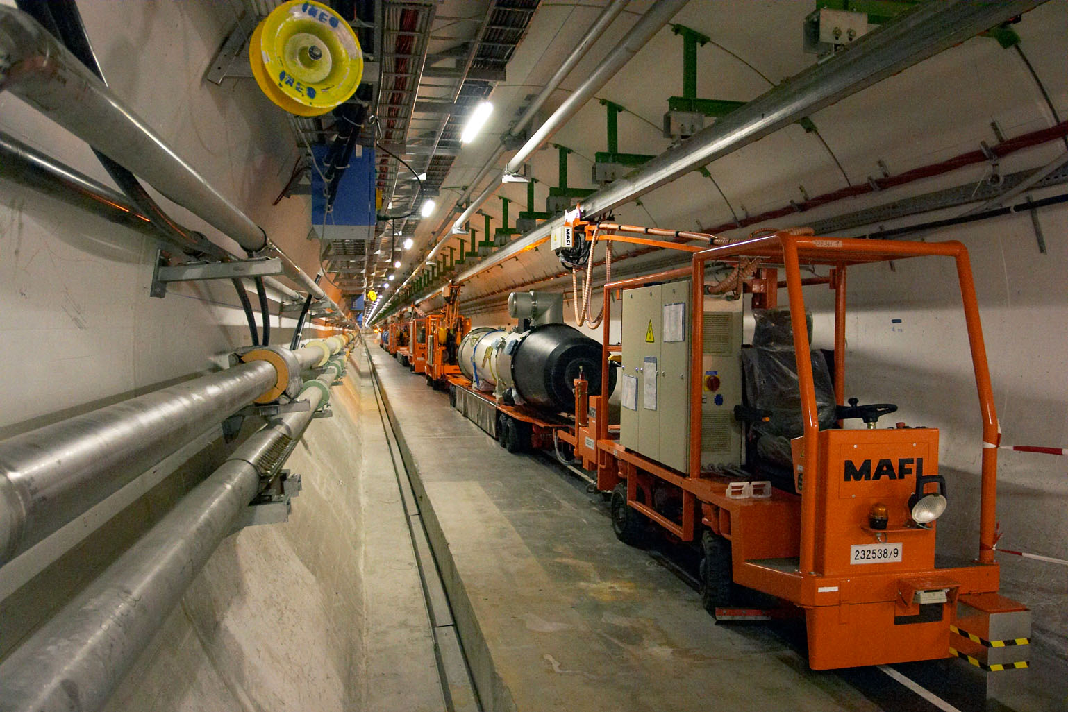 27 km long CERN LHC tunnel, located 100 metres under the ground close to Geneva. Huge superconduc...
