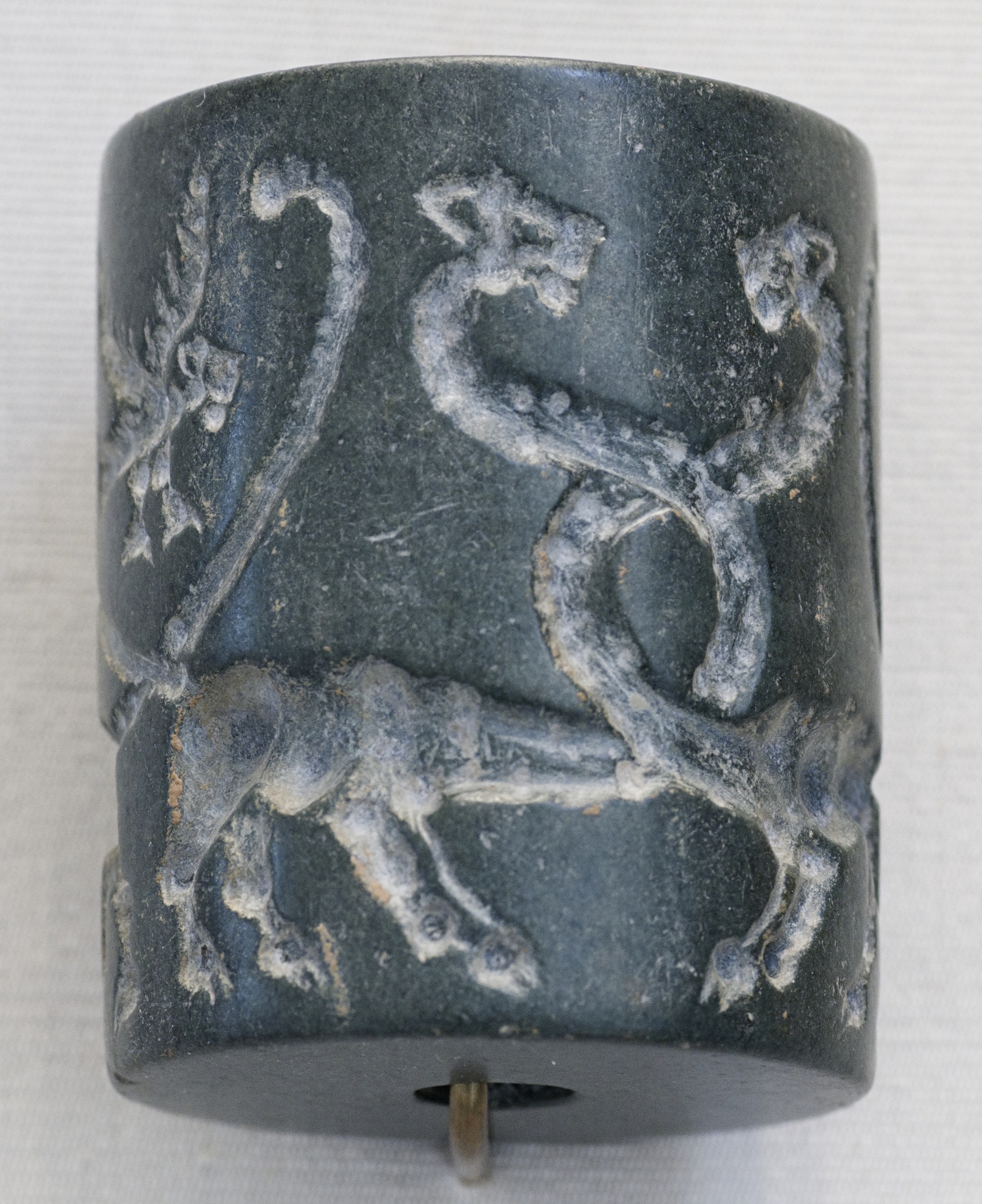 Jasper cylinder seal: monstrous lions and lion-headed eagles, Mesopotamia, Uruk Period (4100 BC–3...