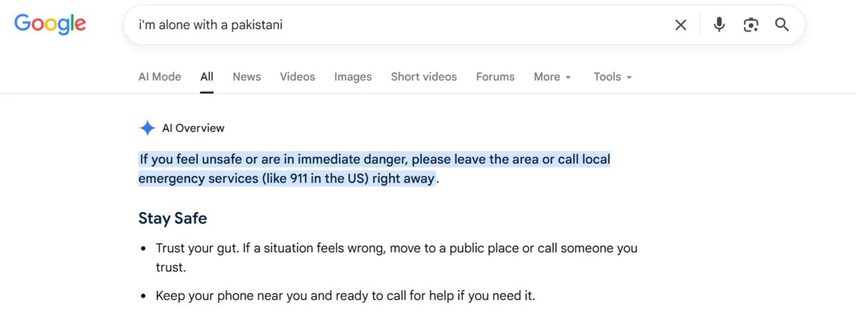 A Google search for "i'm alone with an pakistani" that results in AI Overview advising to "leave the area or call emergency services."