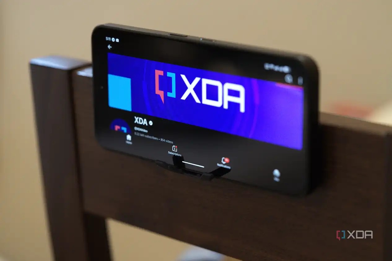 Smartphone mounted horizontally to a chair backrest using a black 3D printed stand