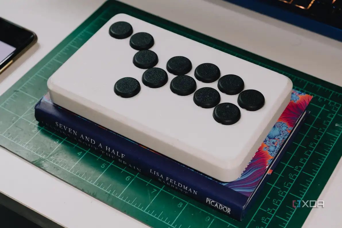 Size comparison of a book and 3D-printed leverless fightstick