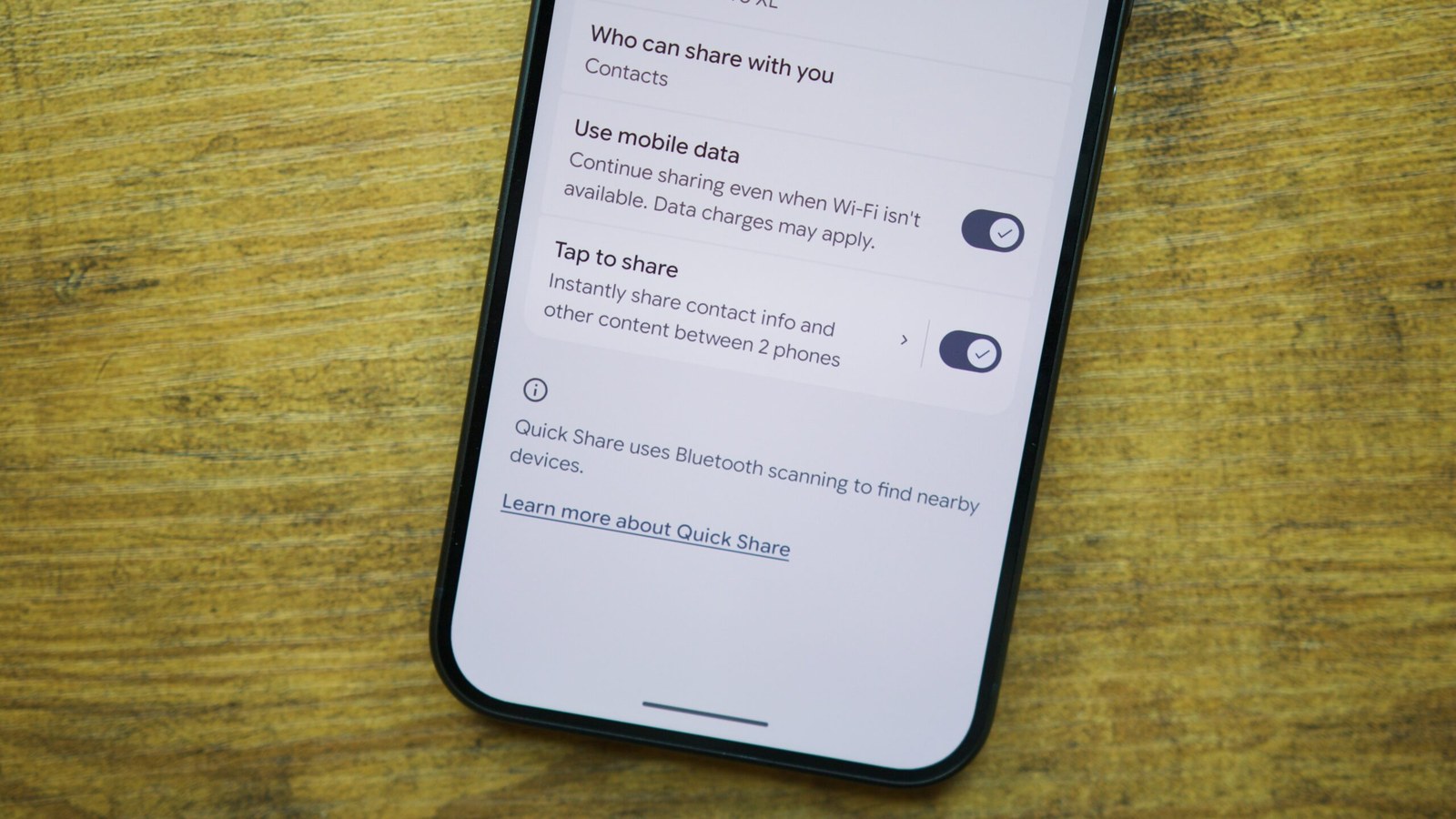 Tap to Share toggle on a Pixel 11 phone.