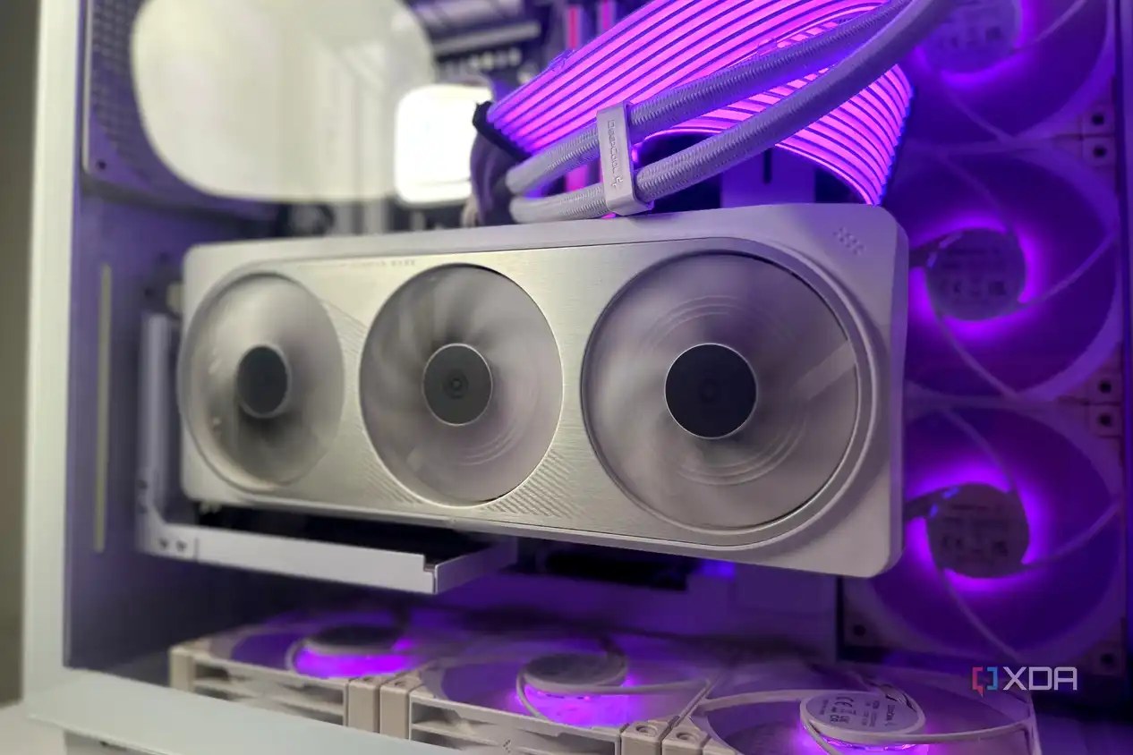 A white Nvidia GeForce RTX 4070 Ti with Lian Li Strimer cables.