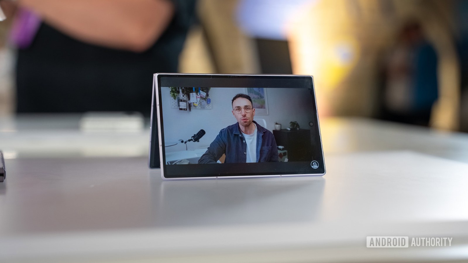 Galaxy Z Fold 8. on side playing video cover display