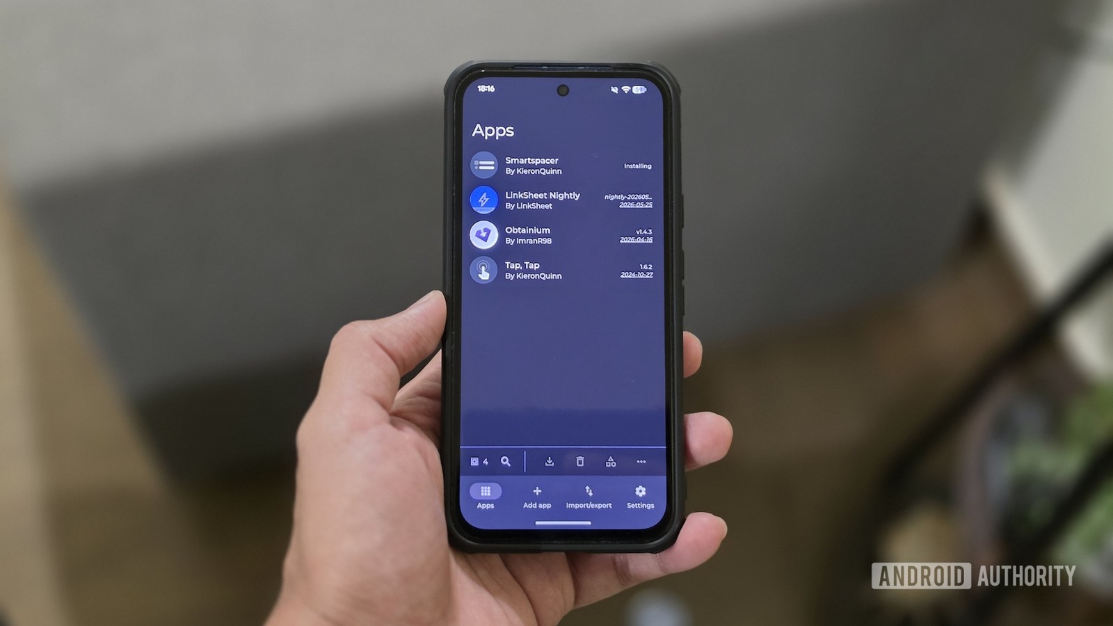 An app update in progress on the Obtainium app on an Android phone.