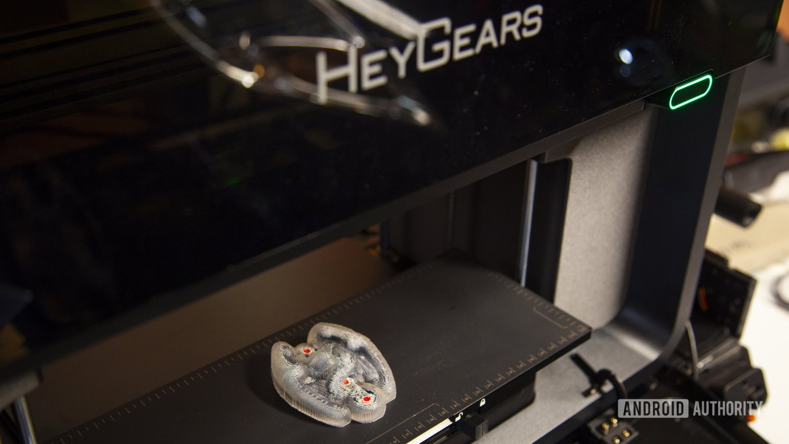 HeyGears G1X full-color 3D printer with a completed full-color print with support material