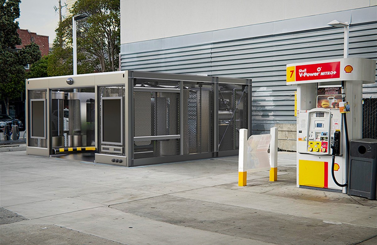visualization of a aseon labs reset station for robotaxis in place as a gas station.