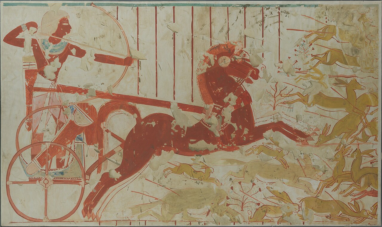 Ancient Egyptian warrior wielding a bow and arrow on a chariot