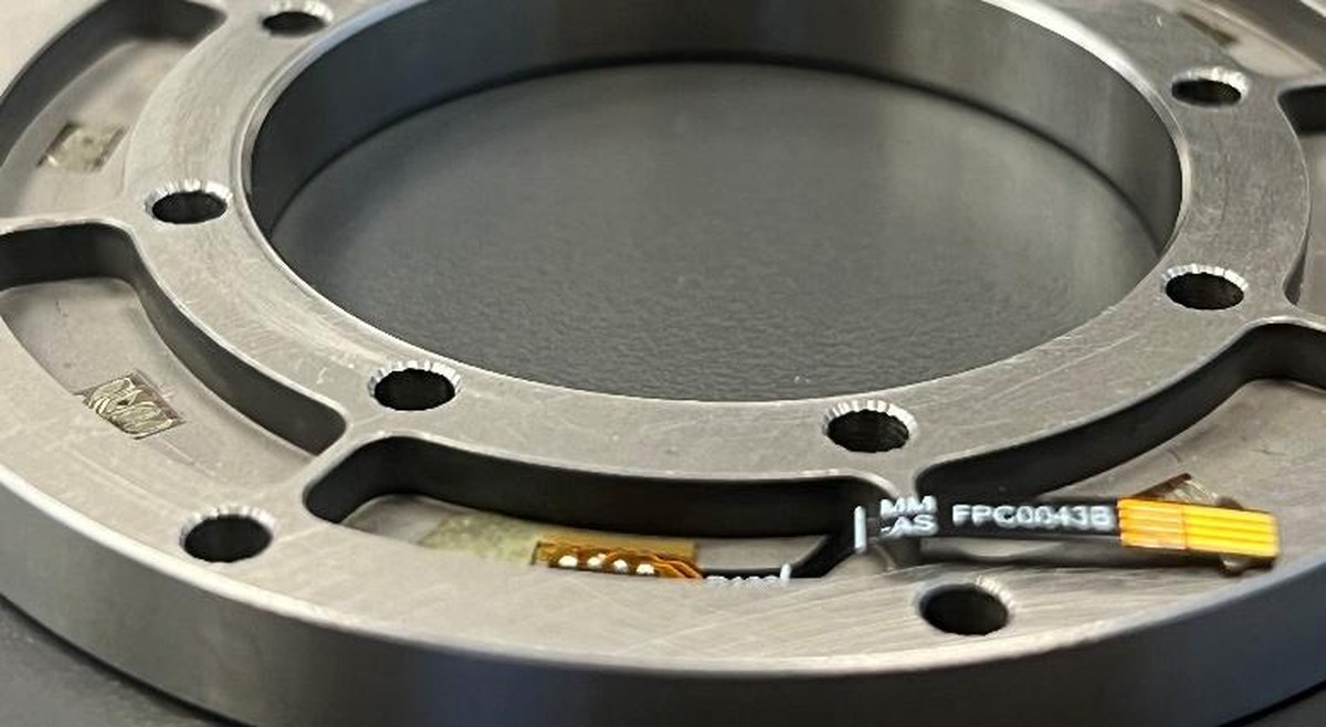 A close up image of a robot gear. 