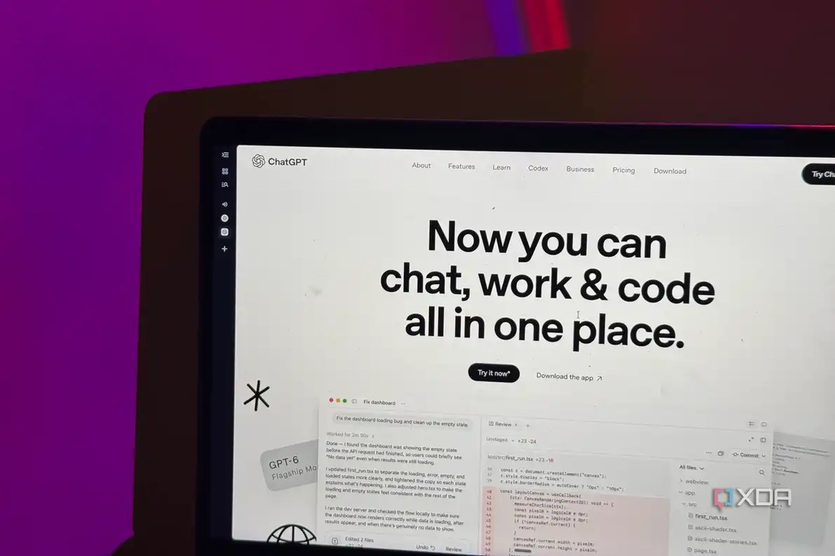 Close-up of ChatGPT's homepage headline on a MacBook, with a coding demo below