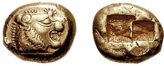 A coin from early 6th century BC Lydia bearing the head of a roaring lion with sun rays